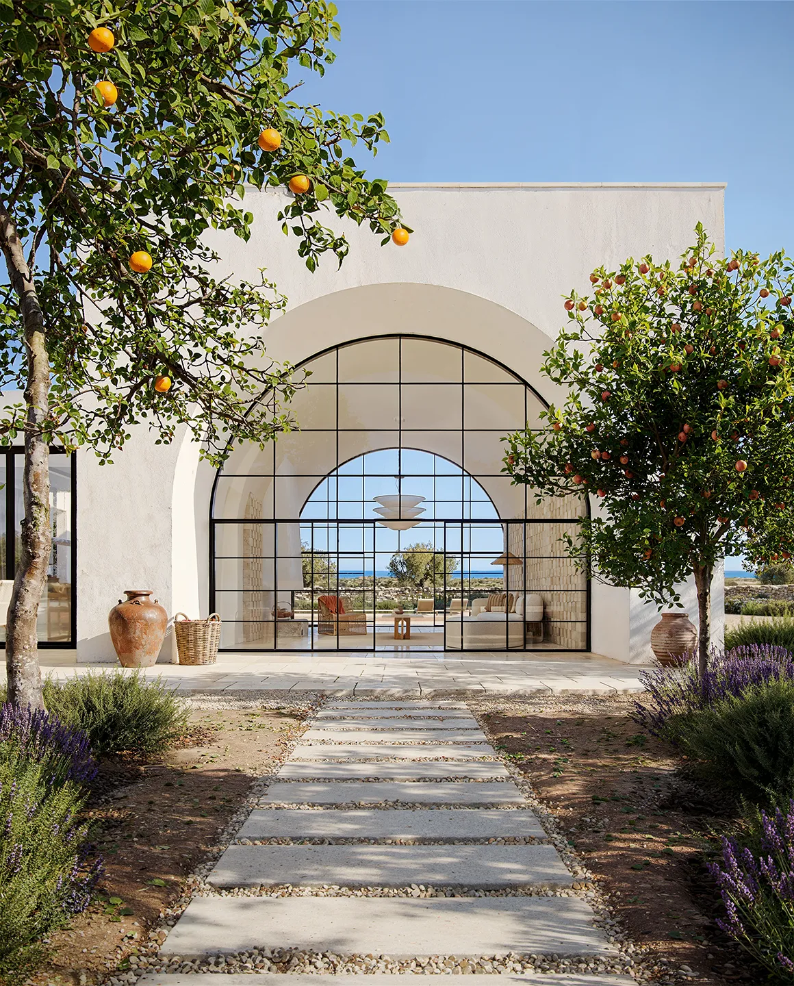 Lamalunga Villa, a contemporary residence with a private pool surrounded by the landscapes of Italy's Itria Valley.