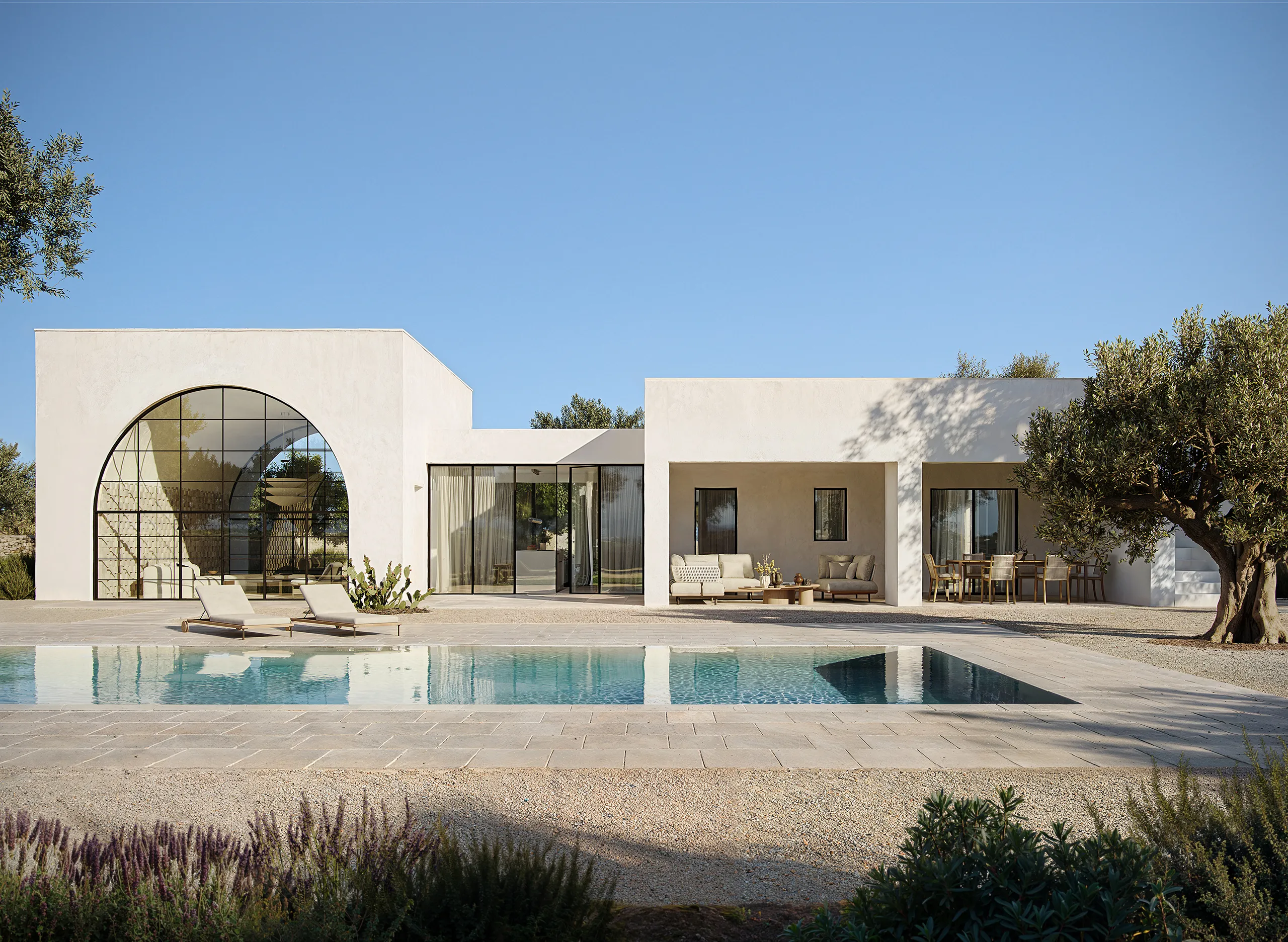 Patio esterno di una villa Vitria pensato per vivere gli spazi all'aperto in ogni stagione.